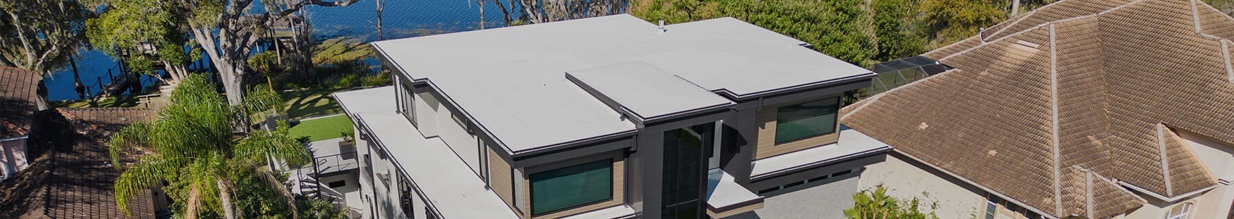 Aerial view of Lake Sheen Estate home featuring GAF TPO roofing materials